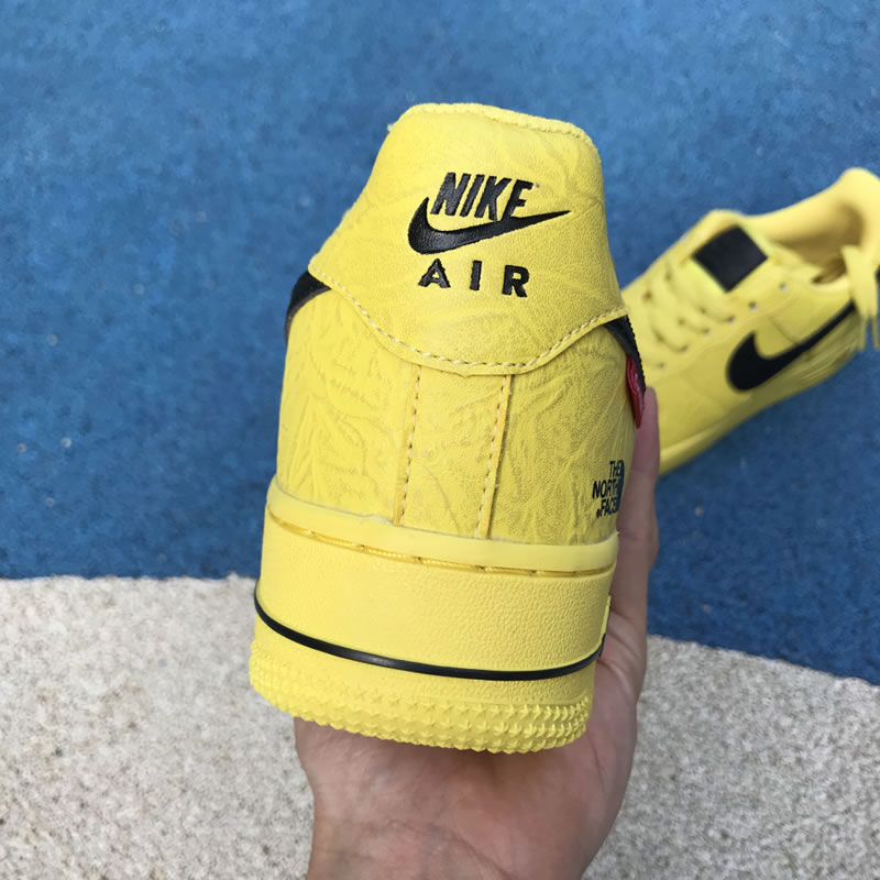 Supreme The North Face Nike Air Force 1 Sup AF1 Low Yellow Black AR3066-400 In Hand Heel Image