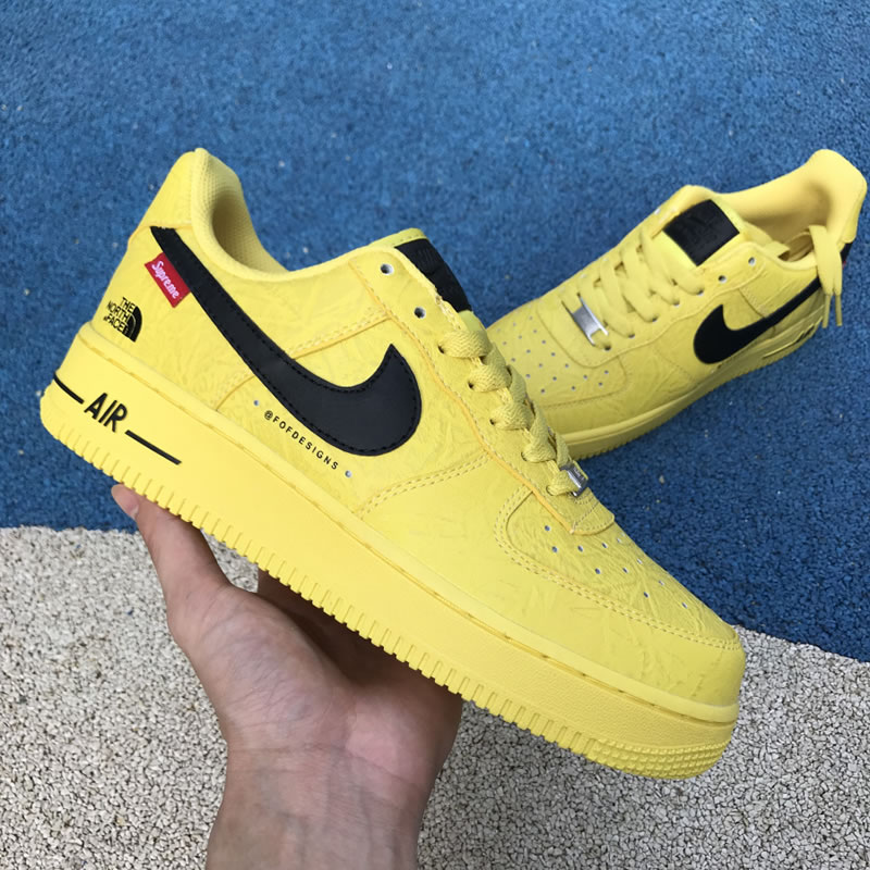 Supreme The North Face Nike Air Force 1 Sup AF1 Low Yellow Black AR3066-400 In Hand Lateral Image