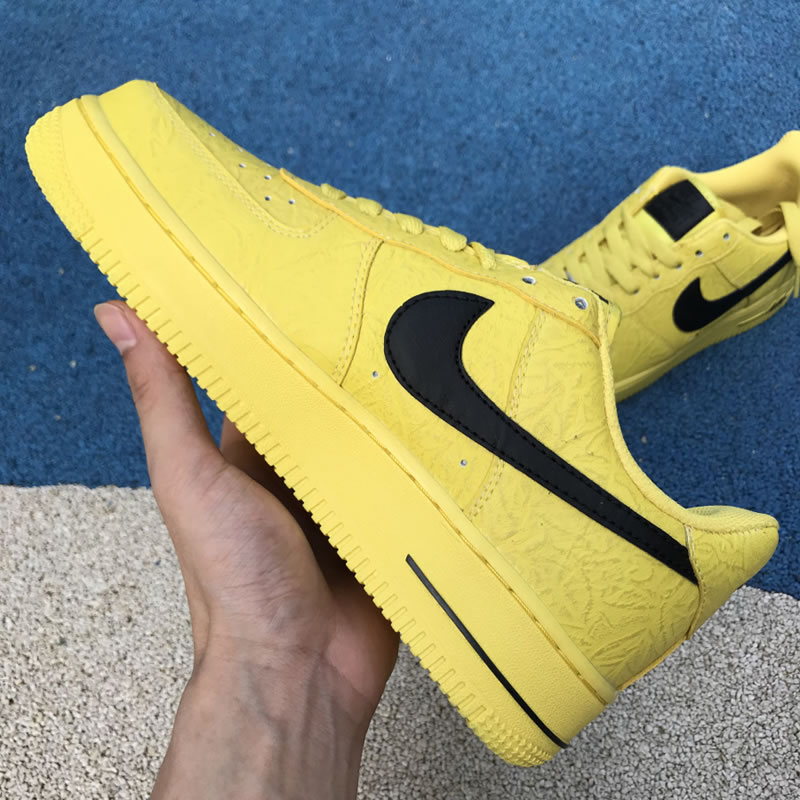 Supreme The North Face Nike Air Force 1 Sup AF1 Low Yellow Black AR3066-400 In Hand Medial Image