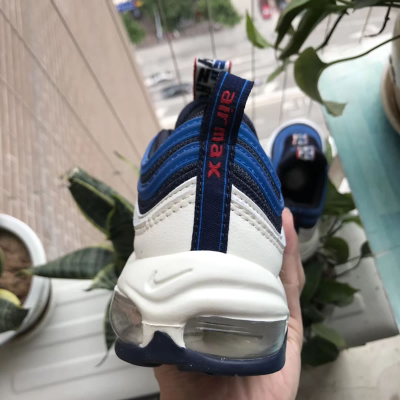 Nike Air Max Plus 97 TT SE Obsidian/Blue/University Red For Sale In Hand Behind Image